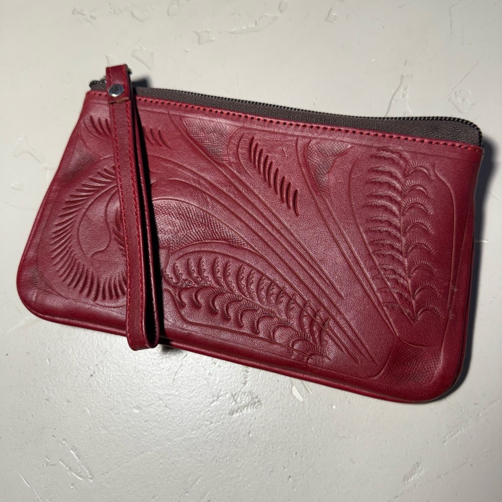Leaders in leather red pouch